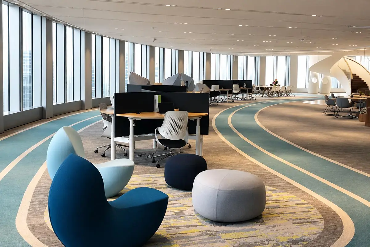 height adjustable workstations in a modern open plan office project