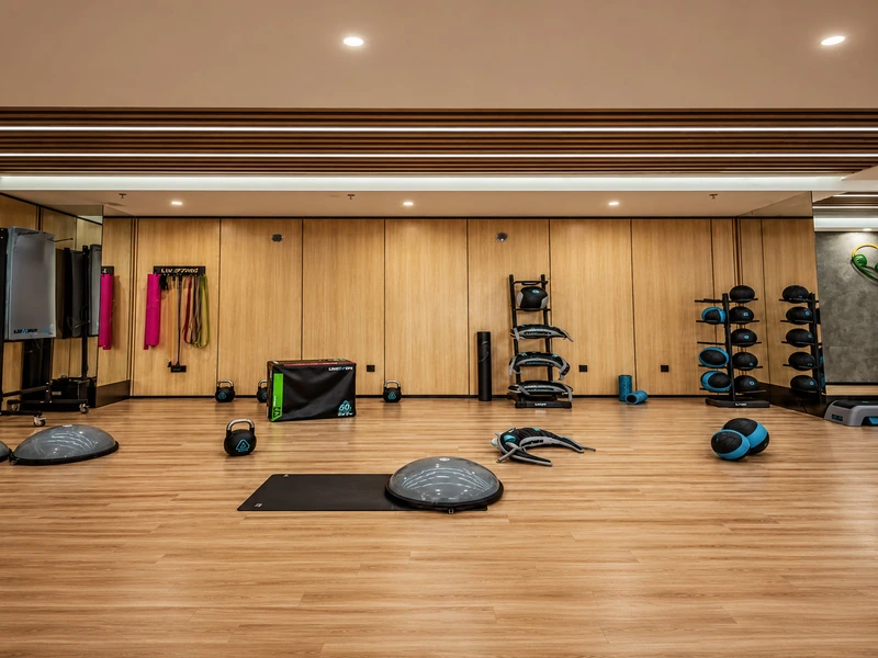 commercial fitness studio with walnut finish wall cladding and exercise area