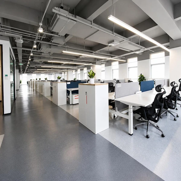 height adjustable workstations in a large open plan office