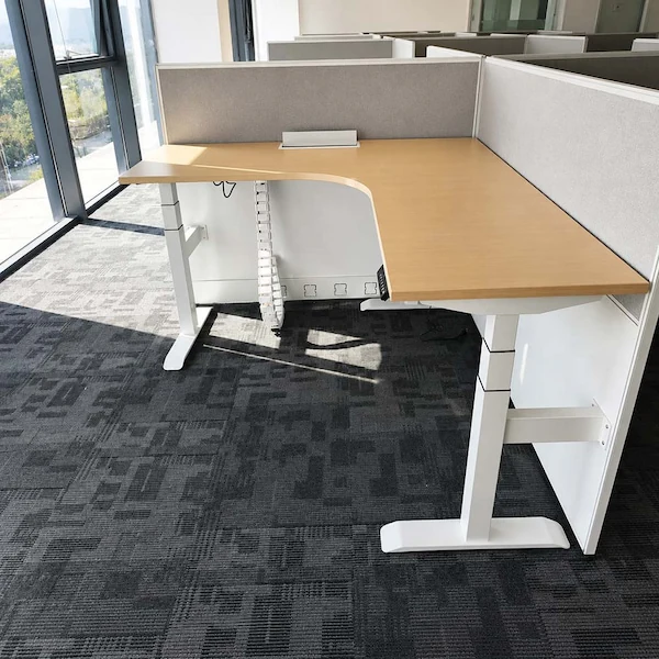 l shaped height adjustable workstation with privacy screens and cable management
