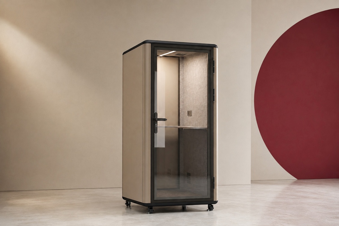 Freestanding office phone booth with enclosed acoustic workspace