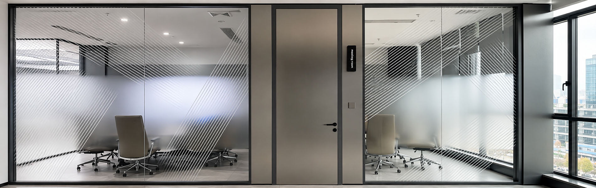 meeting room glass wall with hinged solid door framed glass panels and privacy frosting