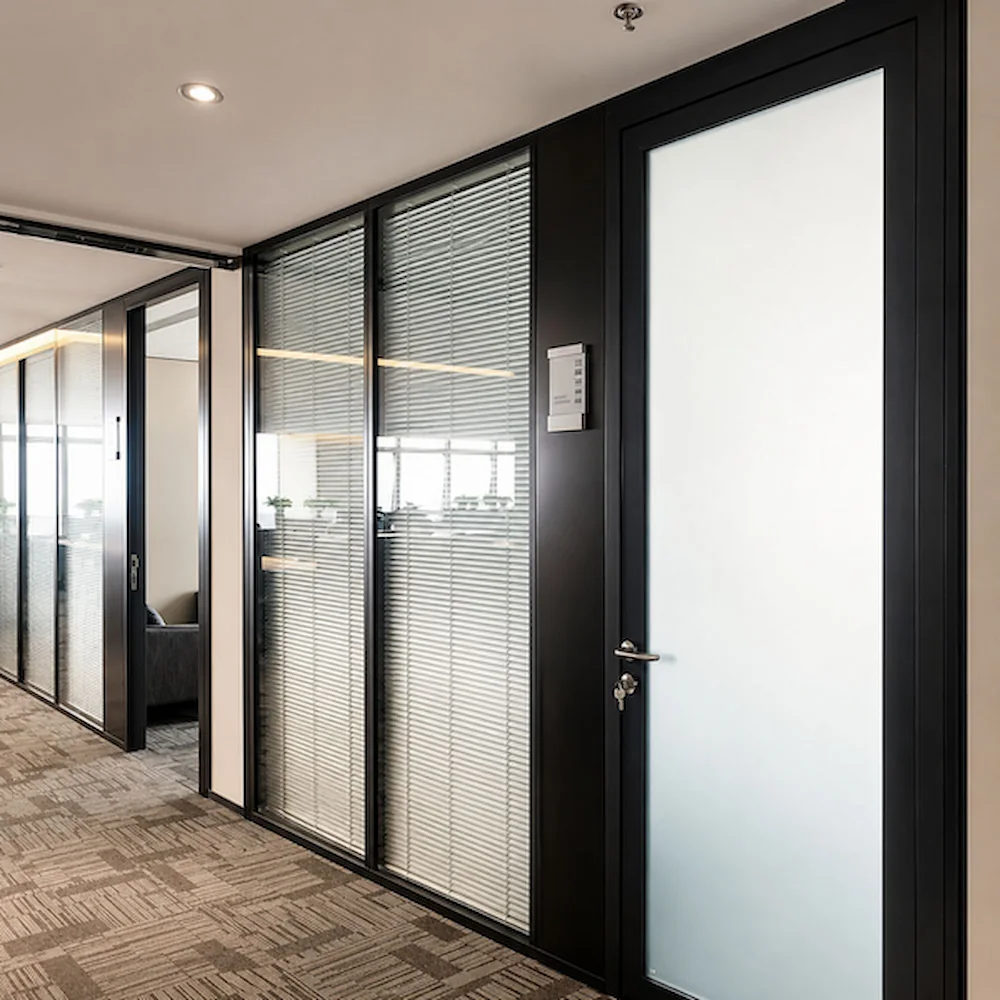 framed glass office partition and door used to compare stc sound isolation and nrc sound absorption concepts