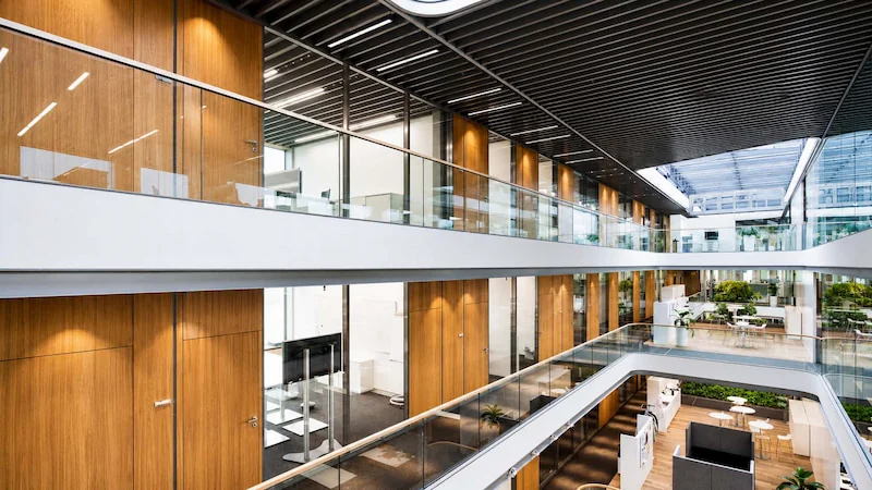 sg-100 glass and wood-finish partition configuration in a commercial office