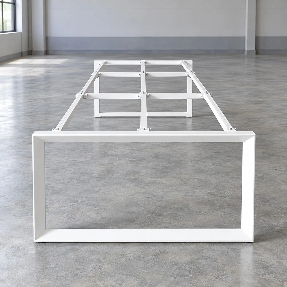 fixed-height office table frame on factory floor