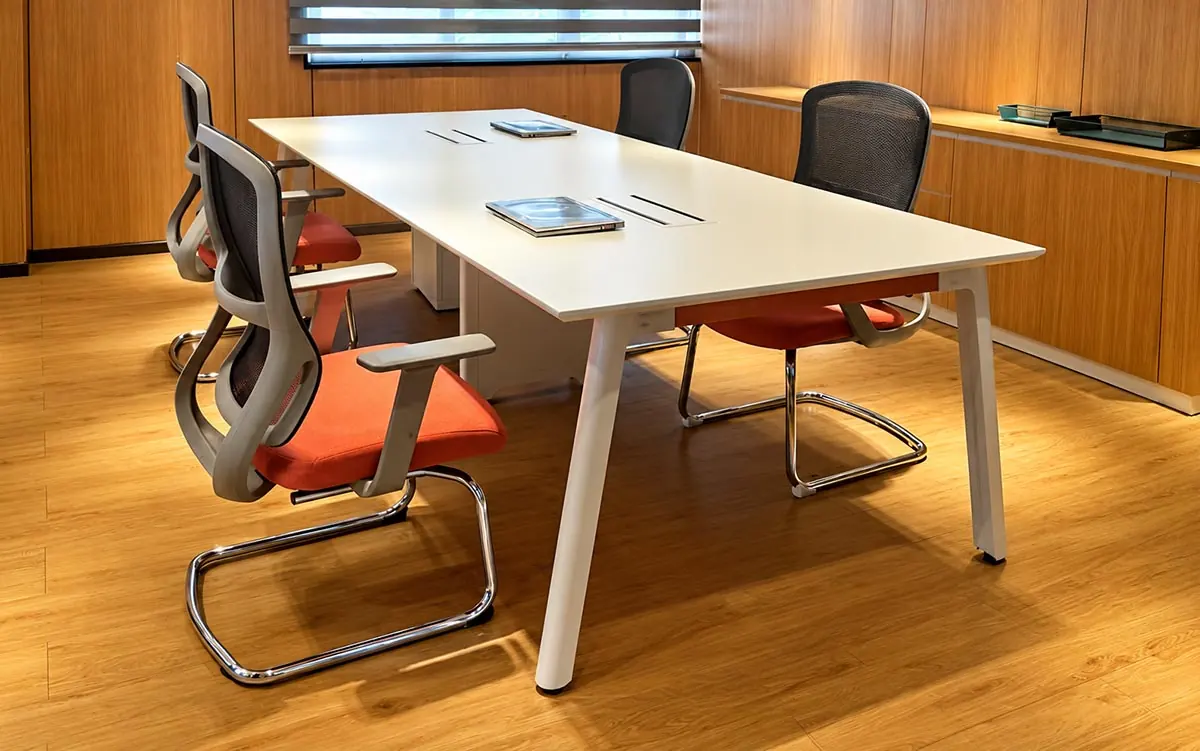 uno fixed-height meeting table with slanted formed steel legs