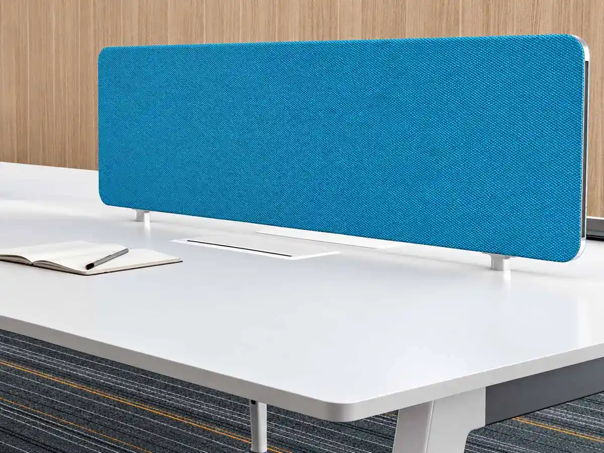 fabric wrapped steel desk screen installed on office workstation