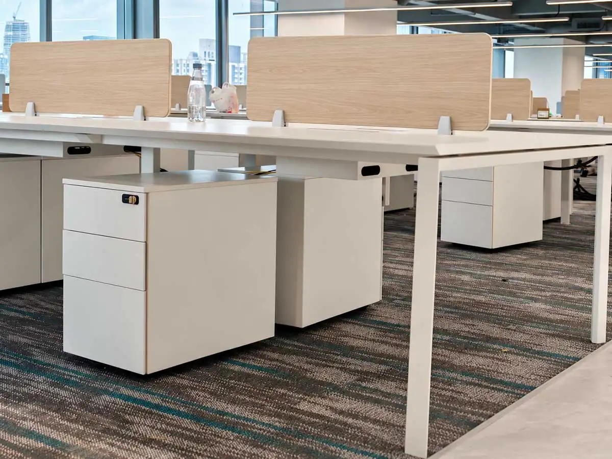 melamine desk screens installed on office workstations