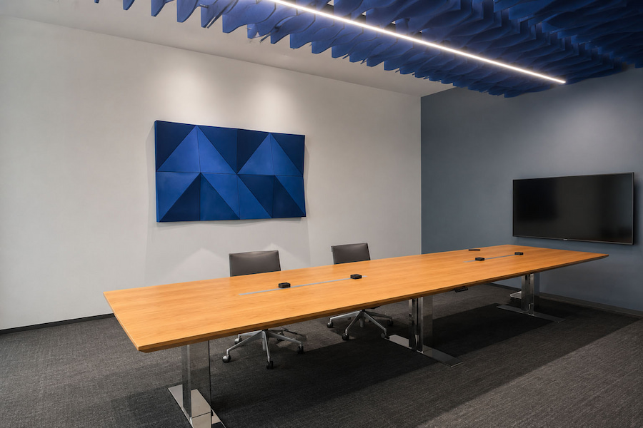 height adjustable conference table in modern meeting room
