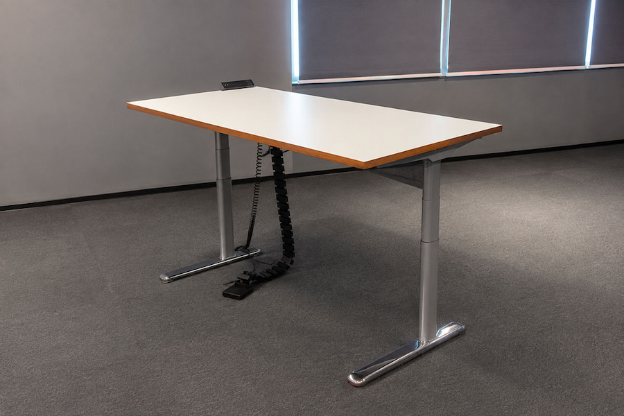 height adjustable desk with cable management tray and desktop power integration