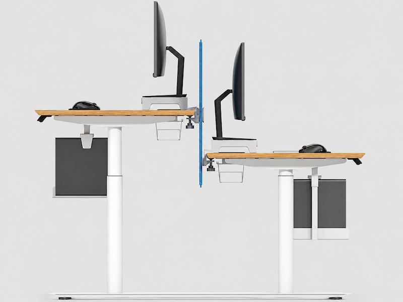 karen height adjustable desks shown at different working heights with office equipment