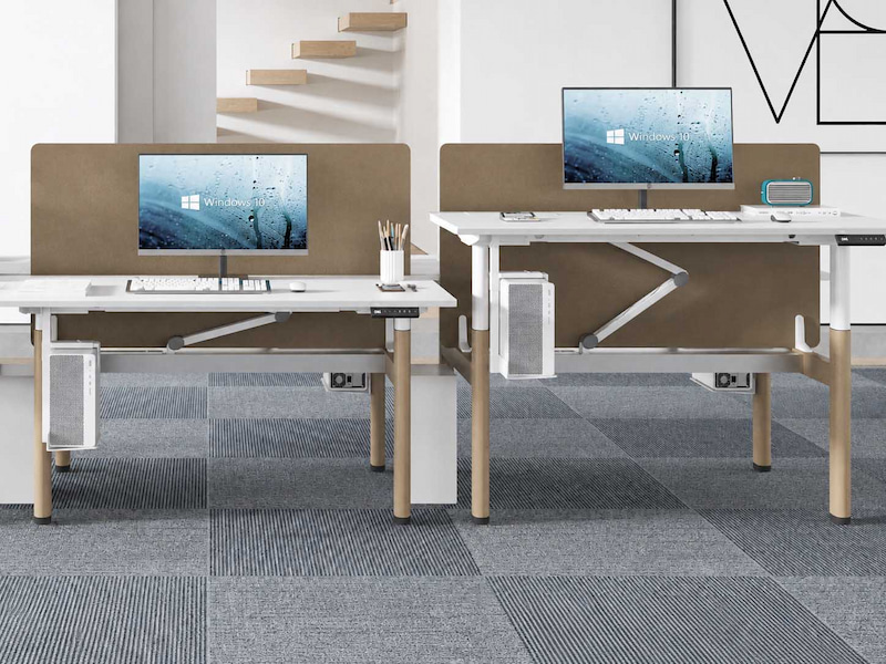 karen height adjustable workstations with monitors and computer equipment