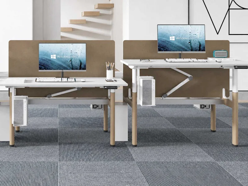 karen height adjustable workstations with monitors and computer equipment