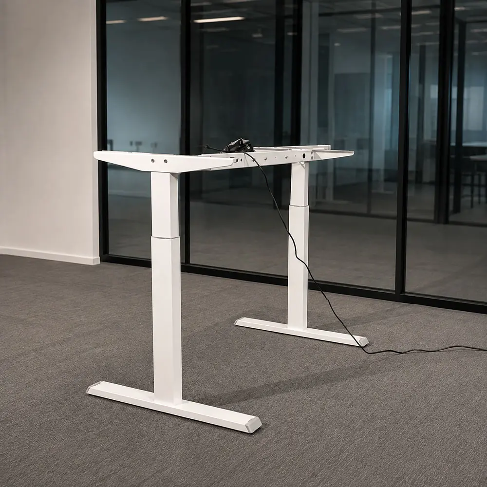 electric height adjustable desk frame showing lifting columns upper frame and connected cabling