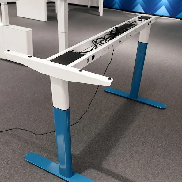 white and blue height adjustable desk frame with an exposed crossbeam wiring and control components for oem configuration review