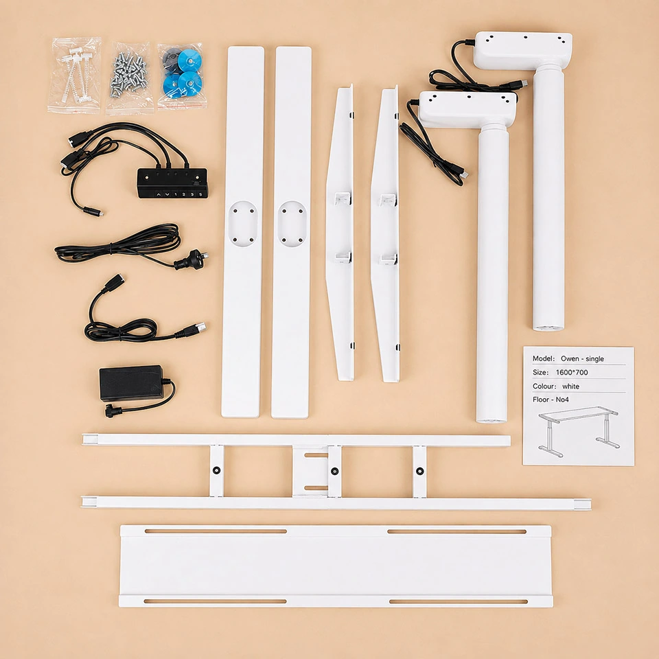 single motor standing desk frame parts, controller, cables, hardware, and packing label laid out for inspection