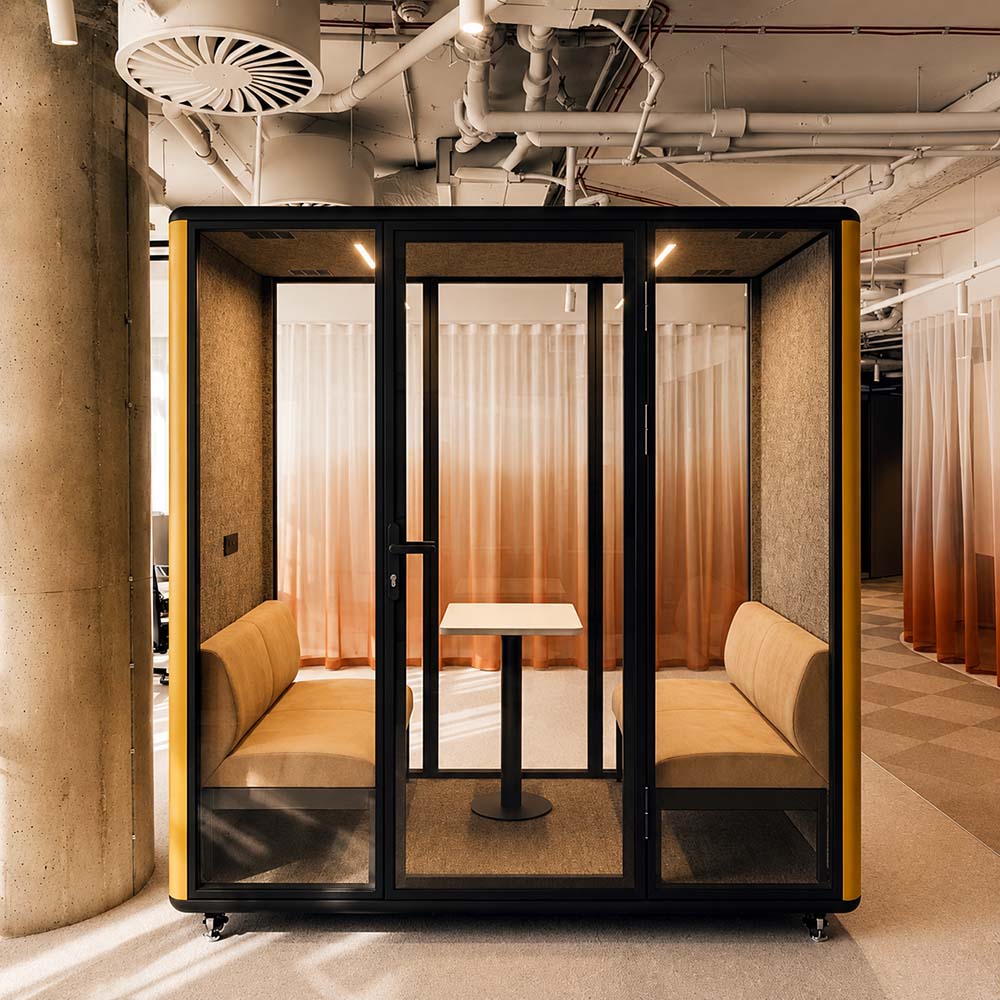 4-person meeting pod with table and bench seating for small group discussions