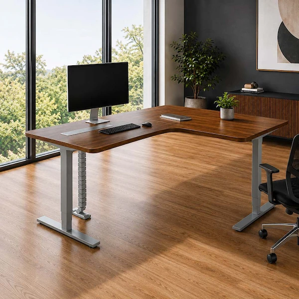height adjustable l shaped workstation with monitor keyboard and mouse in an office