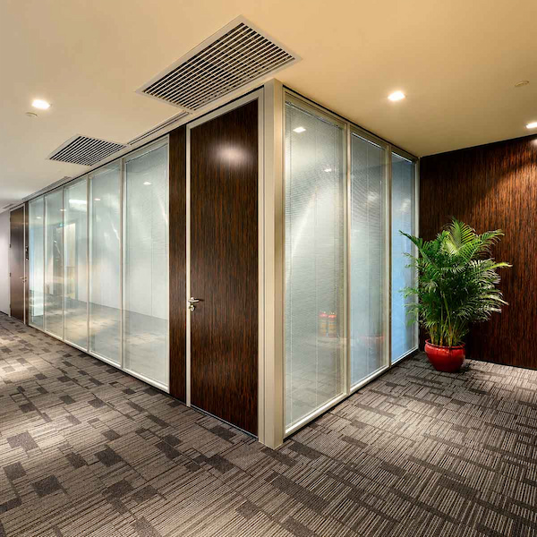 glass partition corridor with wood door panels for acoustic and fire related document guidance