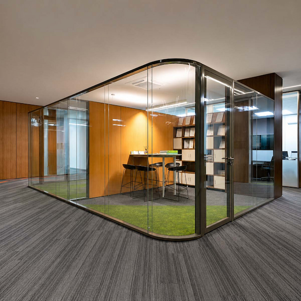 modern office meeting room enclosed by demountable glass partition walls