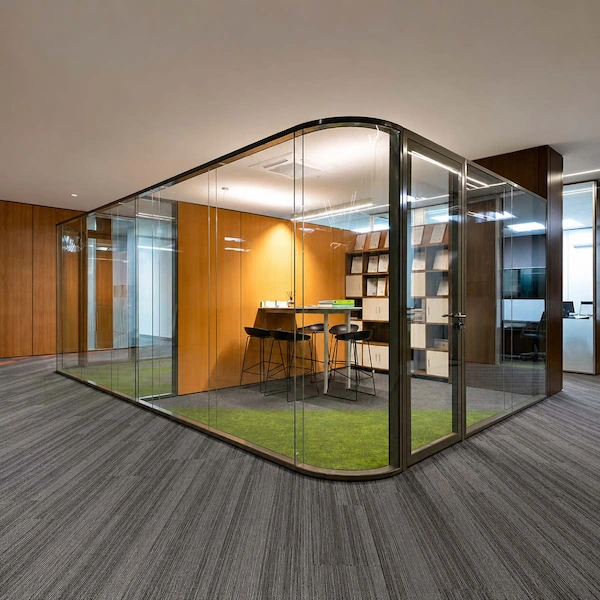 modern office meeting room enclosed by demountable glass partition walls