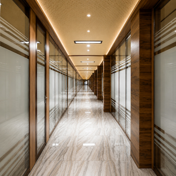 glass fronted office corridor with wood framed demountable partitions