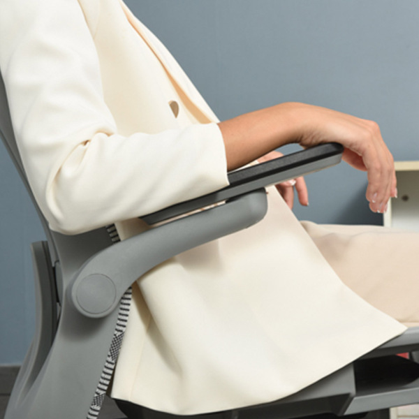 laddy sit on the grey office chair